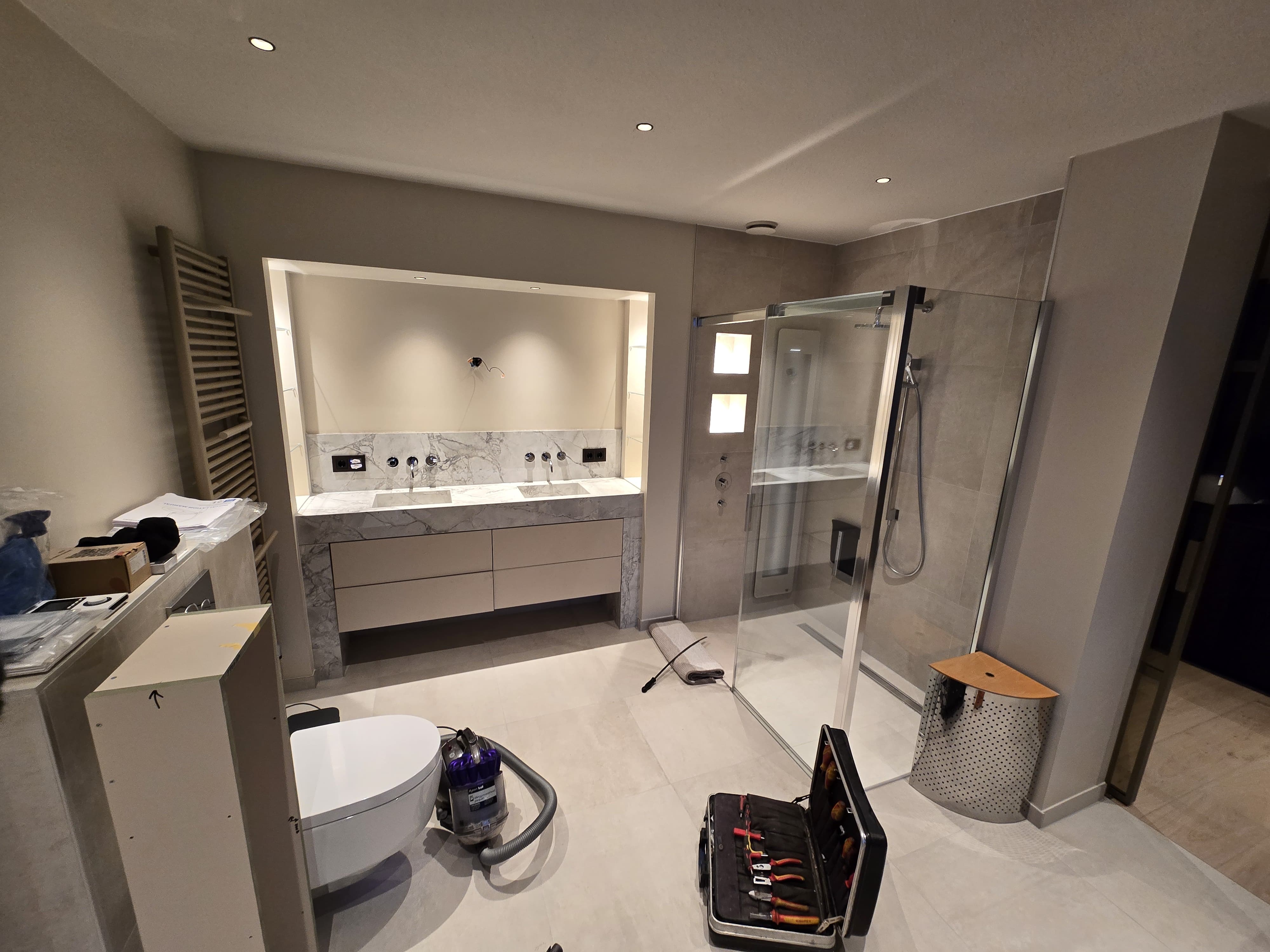 Spacious, fully renovated bathroom with modern fixtures.