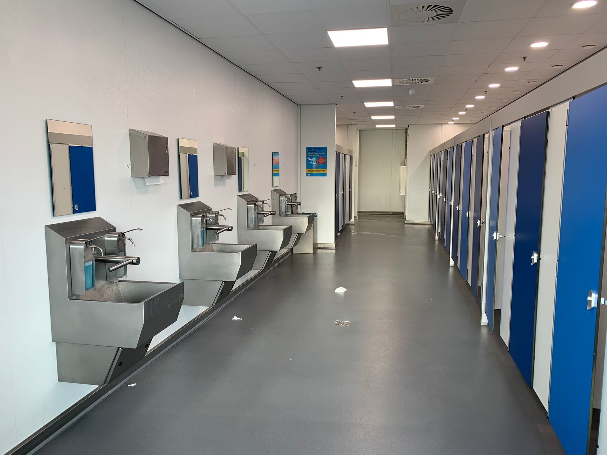 Professional office-space sink installation, optimizing plumbing performance.